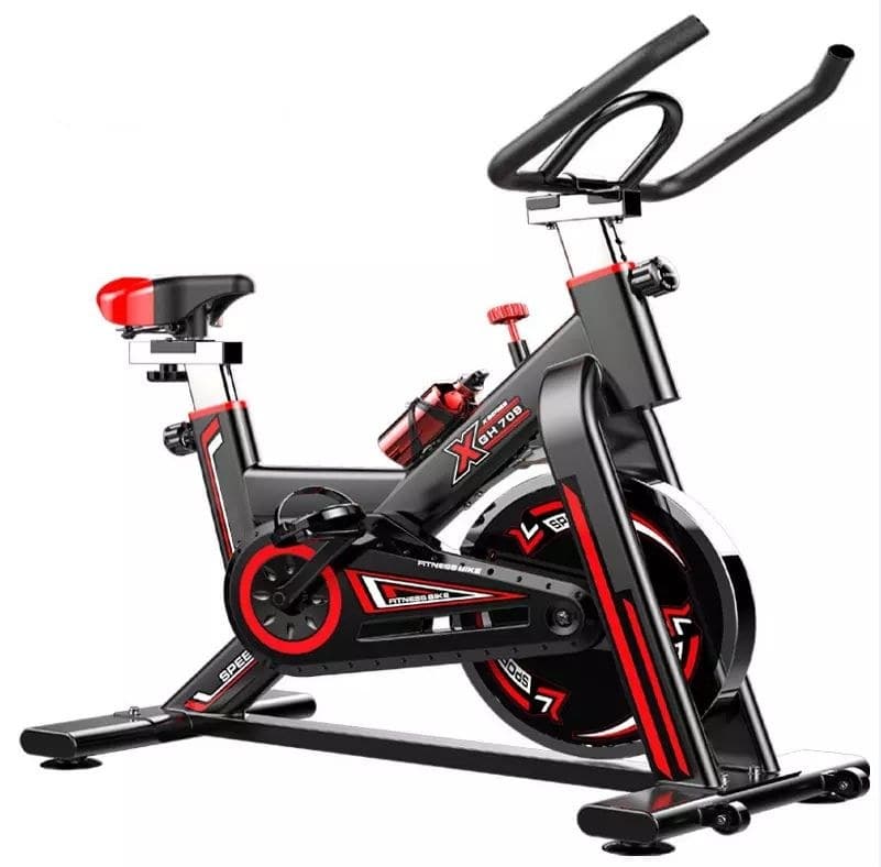 Studio Pro S3 indoor spin bike in black and red, side three-quarter view
