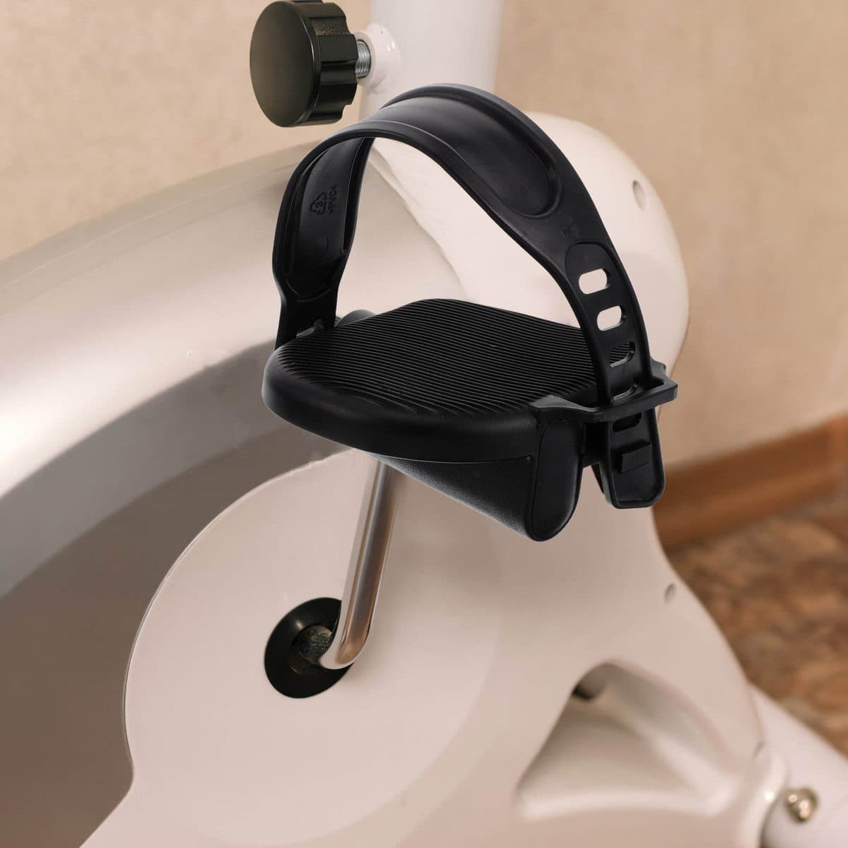 Replacement exercise bike pedal fitted to a bike crank